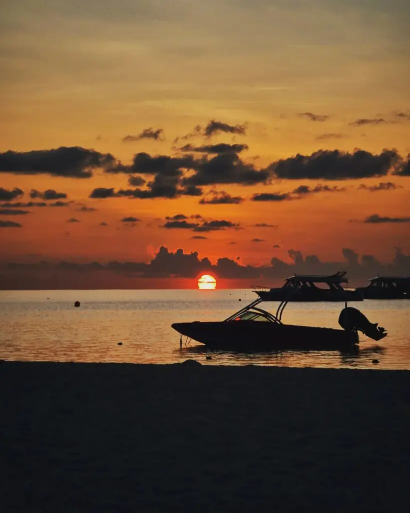 Speedboats in Maldives at sunset